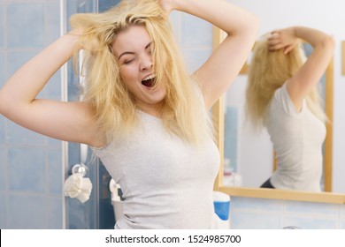 Happy Young Blonde Woman After Waking Up In Bathroom. Female Feeling Great Fresh And Clean.