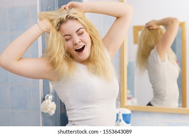 Happy Young Blonde Woman After Waking Up In Bathroom. Female Feeling Great Fresh And Clean.