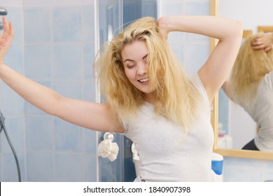 Happy Young Blonde Woman After Waking Up In Bathroom. Female Feeling Great Fresh And Clean.