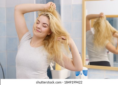 Happy Young Blonde Woman After Waking Up In Bathroom. Female Feeling Great Fresh And Clean.