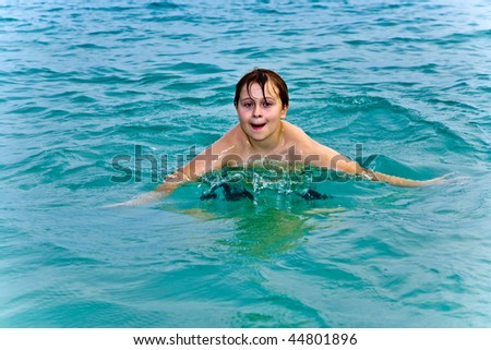 Similar – One happy little boy playing on the beach