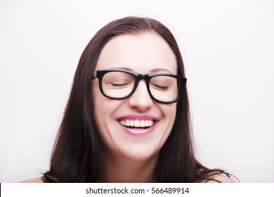  Happy Young Brunette Woman Wearing Eyeglasses With Eyes Closed On White Background