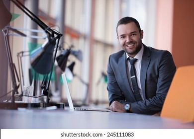 Happy Young Business Man Portrait In Bright Modern Office Indoor