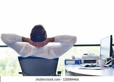 happy young business  man work in modern office on computer - Powered by Shutterstock