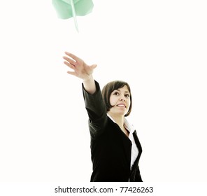 Happy Young Business Woman Isolated Ona White Throwing Paper Airplane