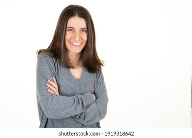 Happy Young Business Woman Posing Arms Crossed Isolated White Wall Background Aside Copy Space In Grey Sweater