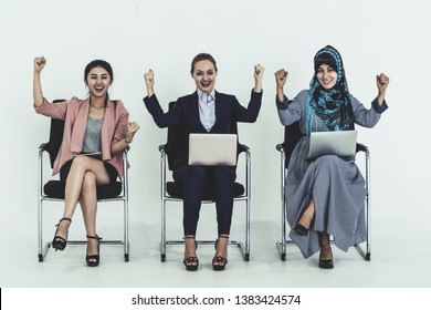 Happy young businesswomen group celebrating work success together. Workplace community and human resources concept. - Shutterstock ID 1383424574