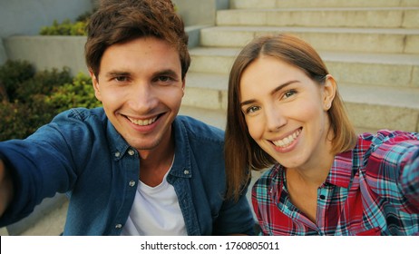 Happy Young Caucasian Couple Having Video Chat On Holiday Trip Sharing Summer Adventures With Friends.