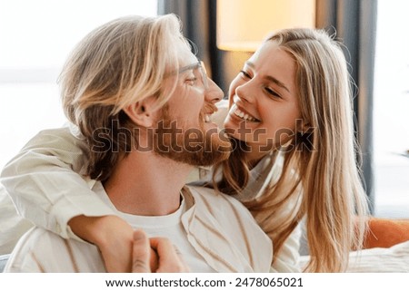 Similar – Image, Stock Photo Moments of tenderness of a happy couple in love on a walk outside the city in autumn among a cornfield