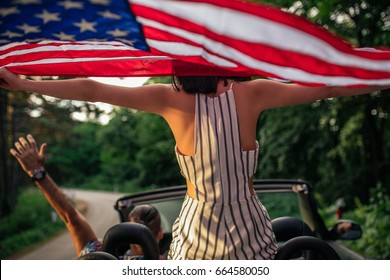 Happy young couple enjoying a road trip together. - Powered by Shutterstock