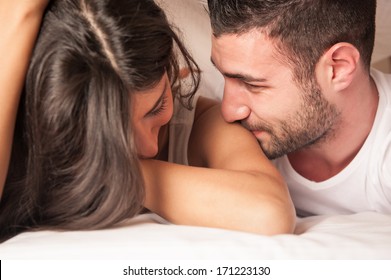 Happy Young Couple Flirting In Hotel Room.