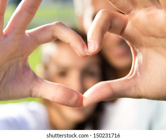 Happy Young Couple Having Fun In A Park