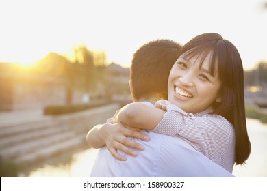 Happy Young Couple Hugging