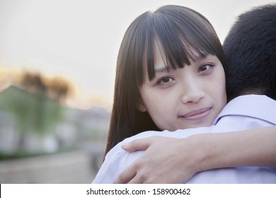 Happy Young Couple Hugging