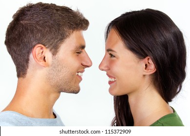 Happy Young Couple Looking At Each Other