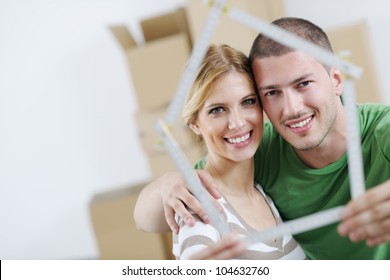 Happy Young Couple Moving In New House