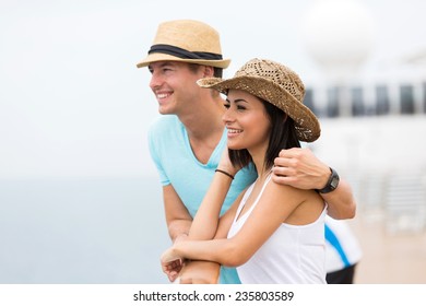 Happy Young Couple On A Cruise