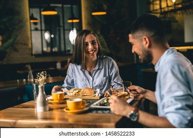 A Happy Young Couple On A Date At A Fancy Restaurant