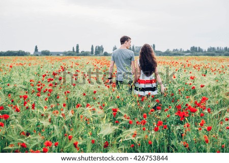 Similar – Image, Stock Photo Woman in poppy field