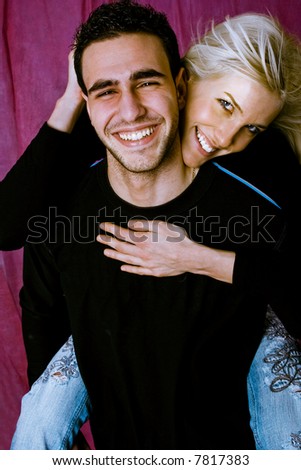 Similar – Image, Stock Photo Studio portrait of a young couple hugging