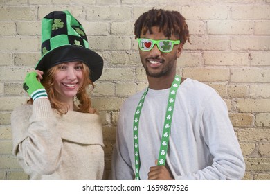 Happy Young Couple Wearing Costumes to Celebrate St. Patrick's Day. - Powered by Shutterstock