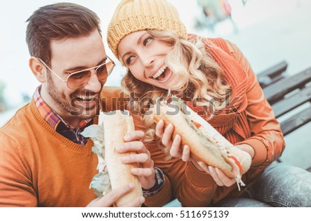 Similar – Mann hält Hot Dog im Barbecue mit Freunden.