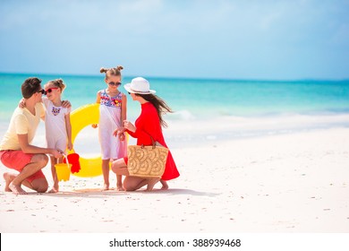 Happy young family beach vacation