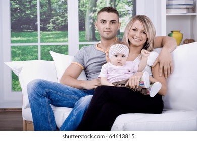 The Happy Young Family Inside The Flat