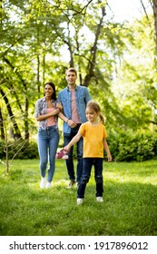 Happy Young Family In The Park