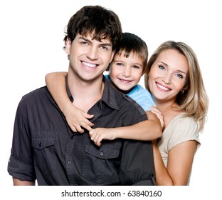 Happy Young Family With Pretty Child Posing On White Background