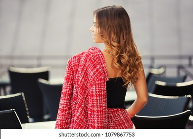 Happy Young Fashion Woman At Sidewalk Cafe Stylish Female Model In Red Tweed Jacket And Black Tank Top