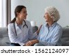 geriatric nurse with patient
