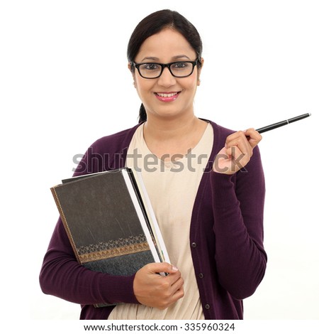 Happy young female student against white background