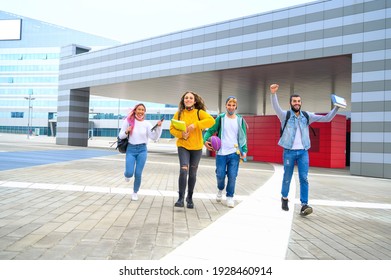 Happy Young Friends Making Victory Sign For The End Of School - Multiracial Teenagers With Face Mask Enjoying Time Together And Having Fun - New Normal Lifestyle Concept Friendship In Covid Time