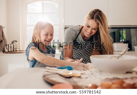 Similar – Image, Stock Photo Young mother with her cute infant baby boy child sitting on bench in city park