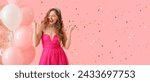 Happy young girl in prom dress, balloons and confetti on pink background with space for text