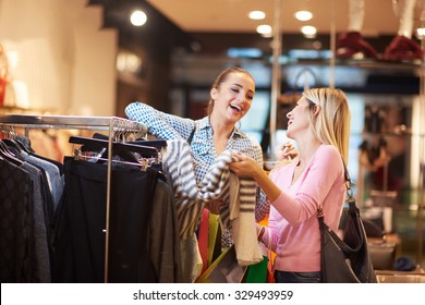 Happy Young Girls In  Shopping Mall, Friends Having Fun Together