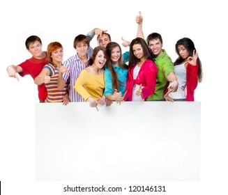 Happy Young Group Of People Standing Together And Holding A Blank Sign For Your Text