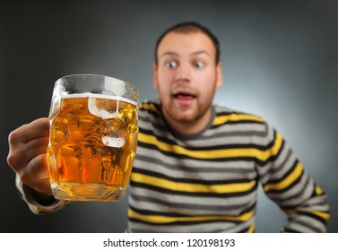 Happy Young Guy Drinking Beer Stock Photo (Edit Now) 117855175