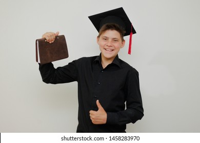 Happy young guy with his book graduated the college!