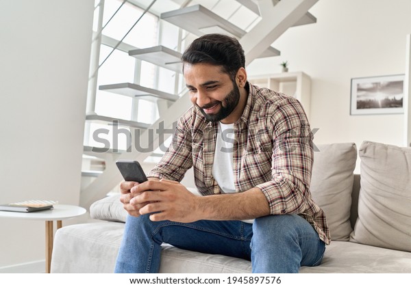 Happy Young Indian Man Using Smart Stock Photo 1945897576 | Shutterstock