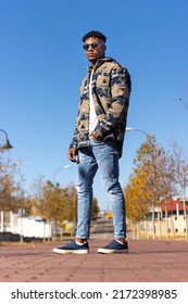 Happy Young Latin African Bearded Man With Short Afro Hair And Sunglasses Posed At The City Streets On Summer