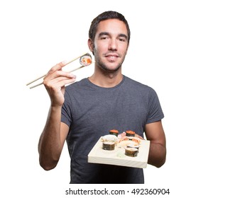 Happy Young Man Eating Sushi