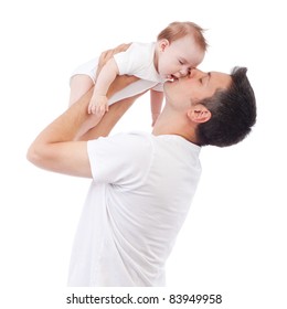 Happy Young Man Holding And Kissing A 4-5 Months Old Baby, Isolated On White