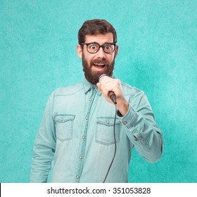 Happy Young Man With Microphone