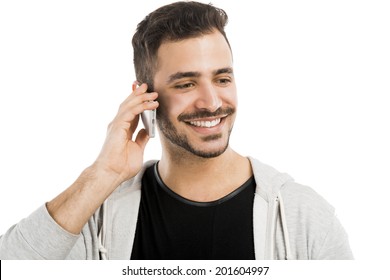 Happy Young Man Talking On Cell Phone Isolated On White Background