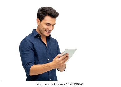 Happy young man using digital tablet isolated on white background
