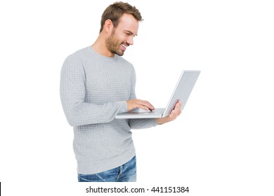 Happy Young Man Using Laptop On White Background