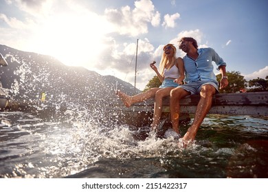 happy young man and woman enjoying together at holiday - Powered by Shutterstock