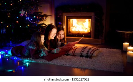 Family Enjoying Movie Night Home Together Stock Photo (Edit Now) 750796270